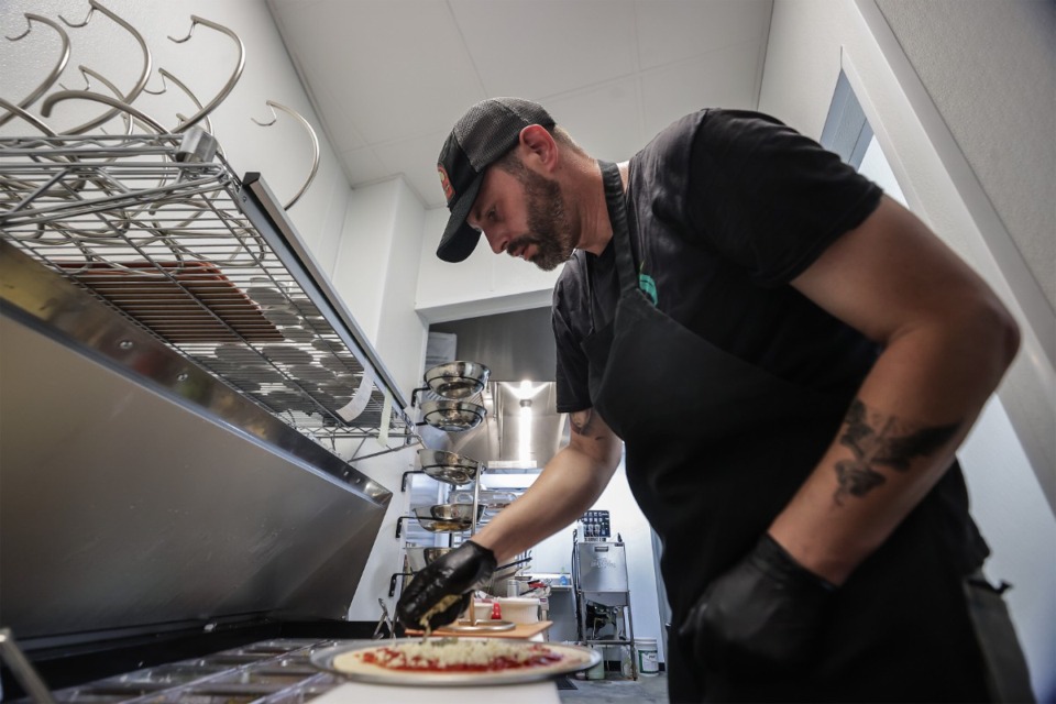 <strong>Tim Scalita makes a pepperoni pizza at Crosstown Brewing Co.</strong>&nbsp;(Patrick Lantrip/The Daily Memphian)