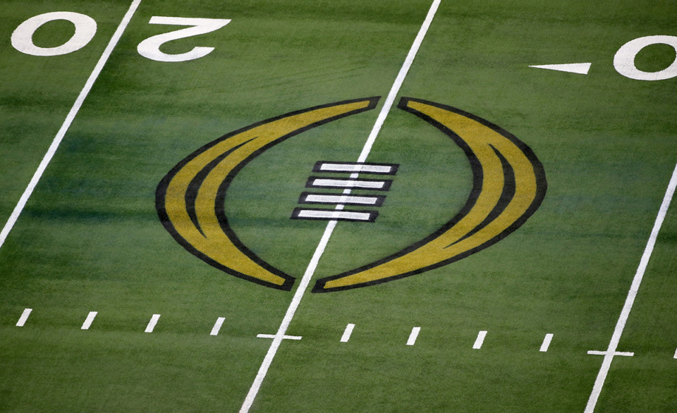 <strong>The College Football Playoff logo is shown on the field at AT&amp;T Stadium before the Rose Bowl NCAA college football game between Notre Dame and Alabama in Arlington, Texas, Jan. 1, 2021.</strong> (Roger Steinman/AP file)