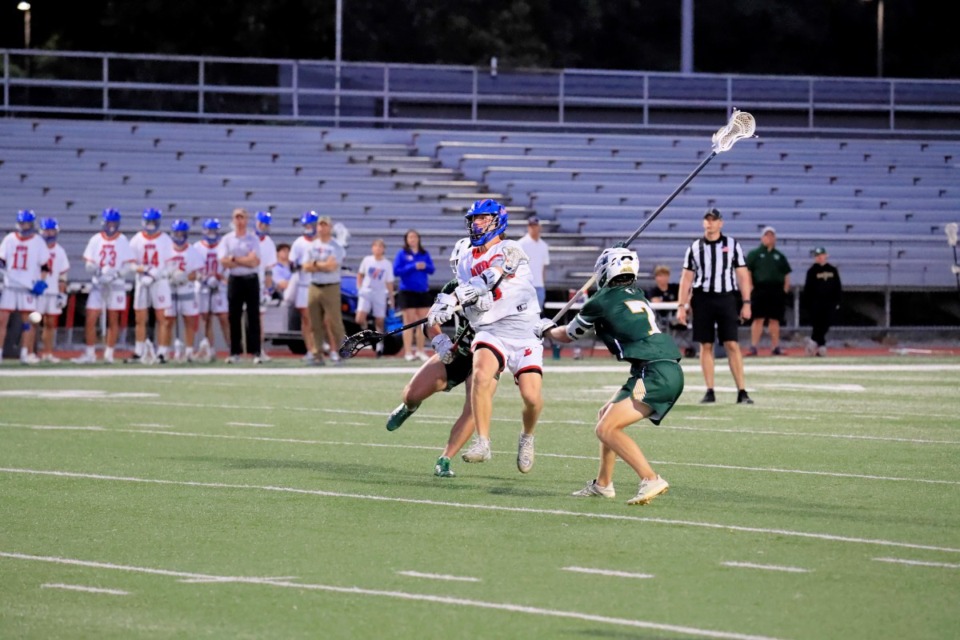 <strong>MUS&rsquo; Hays Prather (center) was named state player of the year by the National Interscholastic Lacrosse Coaches Association after leading the Owls to a 14-4 record and a victory over Chattanooga McCallie in the state championship game.</strong> (Courtesy MUS)