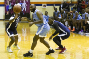 <strong>Shelby County Mayor Lee Harris makes a pass during the Heal The Hood Foundation Celebrity Basketball Game at Ridgeway High School Saturday, June 8.</strong> (Brad Vest/Special to The Daily Memphian)