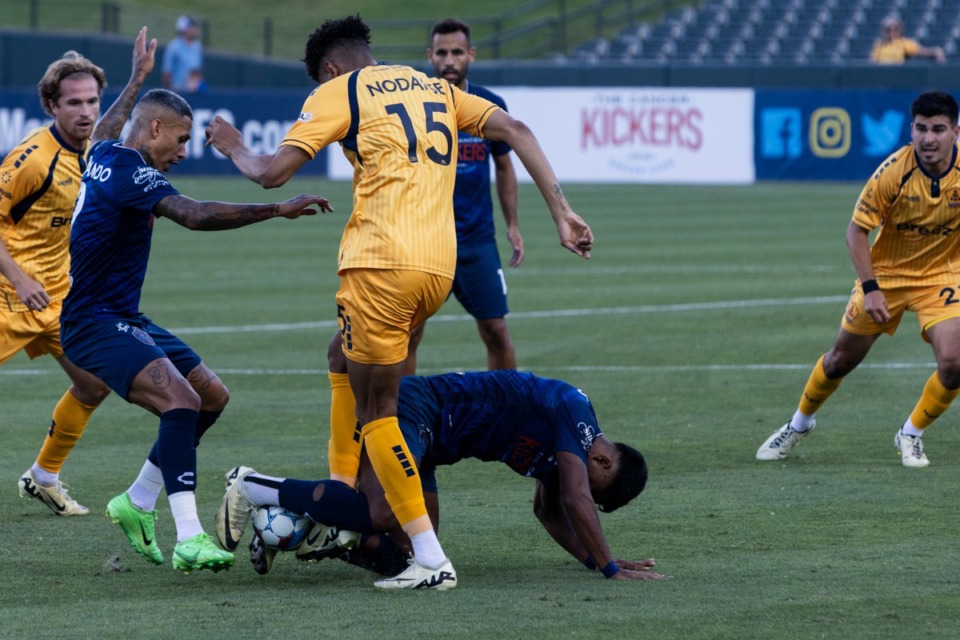 <strong>Players battle for the ball during the 901 FC match against Rhode Island at AutoZone Park June 12, 2024.</strong> (Brad Vest/Special to The Daily Memphian)