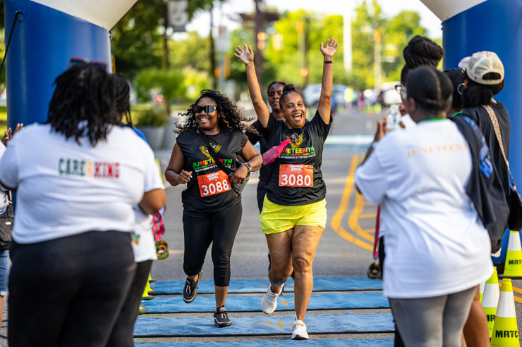 <strong>Participants finish the 2&frac12;-mile run at the Juneteenth Festival at Health Sciences Park June 15.</strong> (Benjamin Naylor/The Daily Memphian)