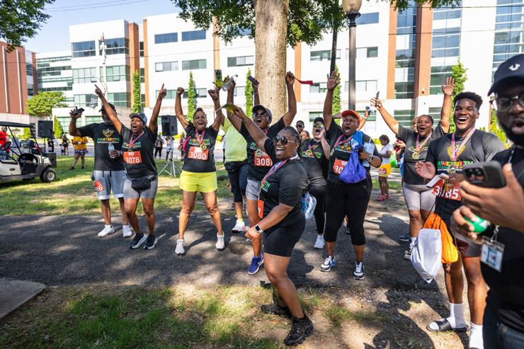 <strong>Participants cheer for runners as placement awards are given out.</strong> (Benjamin Naylor/The Daily Memphian)