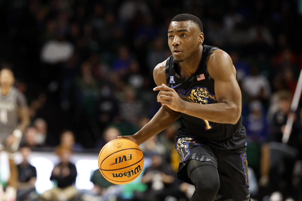 <strong>Memphis guard Jayhlon Young brings the ball downcourt during the second half of a game against UAB, Sunday, Jan. 28, 2024, in Birmingham, Ala.</strong> (Butch Dill/AP Photo)