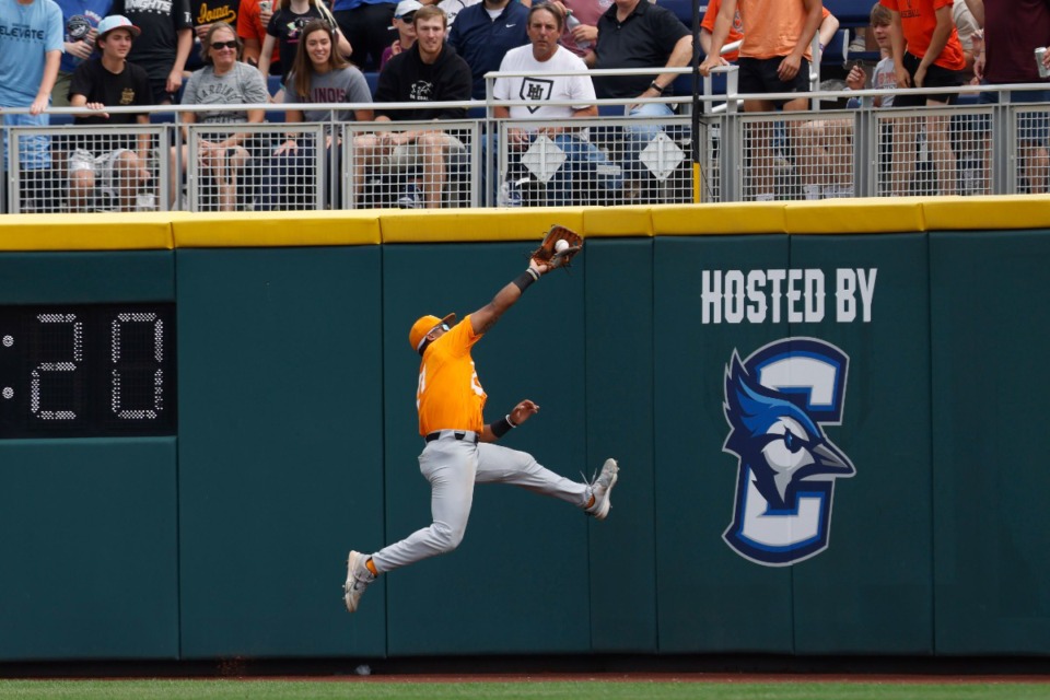 <strong>Tennessee outfielder Kavares Tears (21) makes a leaping catch to end the first inning of an NCAA College World Series baseball game against Florida State on Wednesday, June 19, 2024, in Omaha,</strong>&nbsp;<strong>Nebraska.</strong> (Mike Buscher/AP)