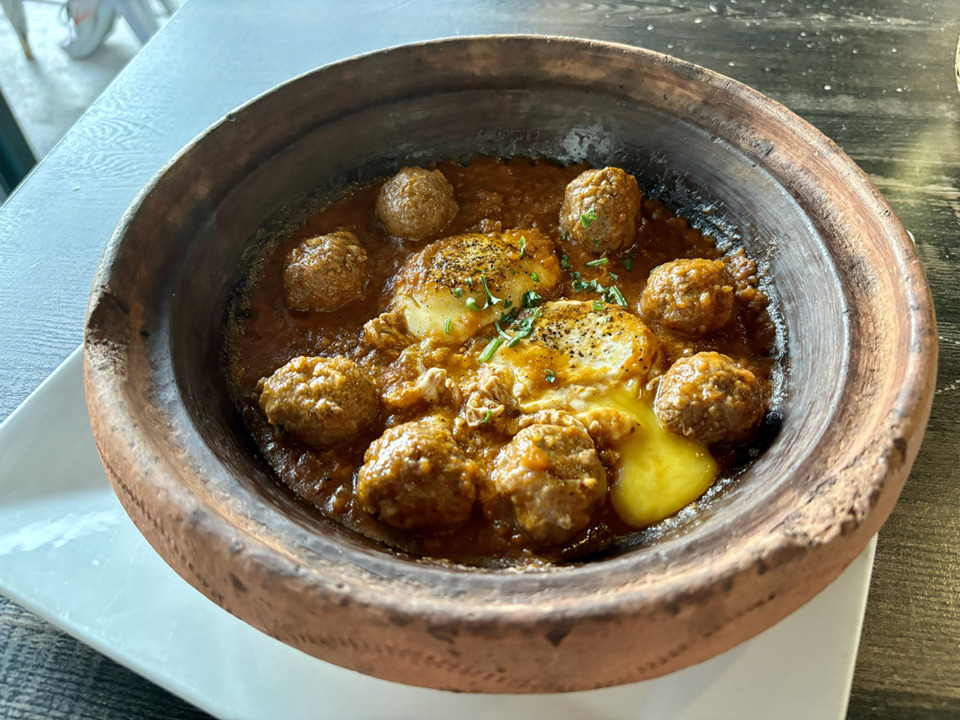 <strong>Andalusia's kefta is a dish of meatballs simmered in tomato sauce with poached eggs.</strong> (Joshua Carlucci/Special to The Daily Memphian)