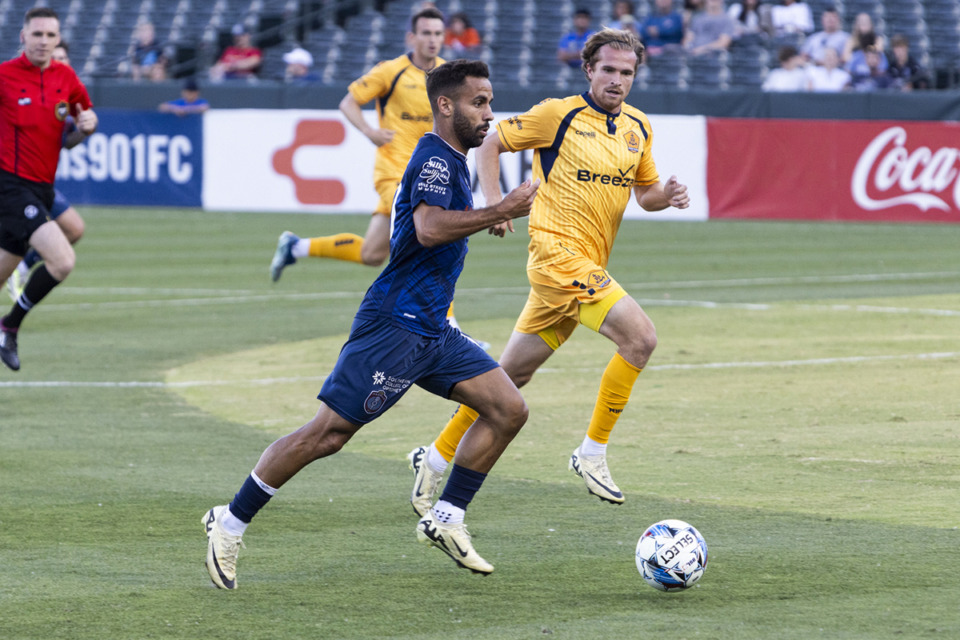 <strong>Memphis 901 FC&rsquo;s Bruno Lapa brings the ball up the field during a match at AutoZone Park against Rhode Island FC. Lapa scored his sixth goal of the season in a game Saturday, June 22, against Las Vegas.</strong> (Brad Vest/Special to The Daily Memphian file)