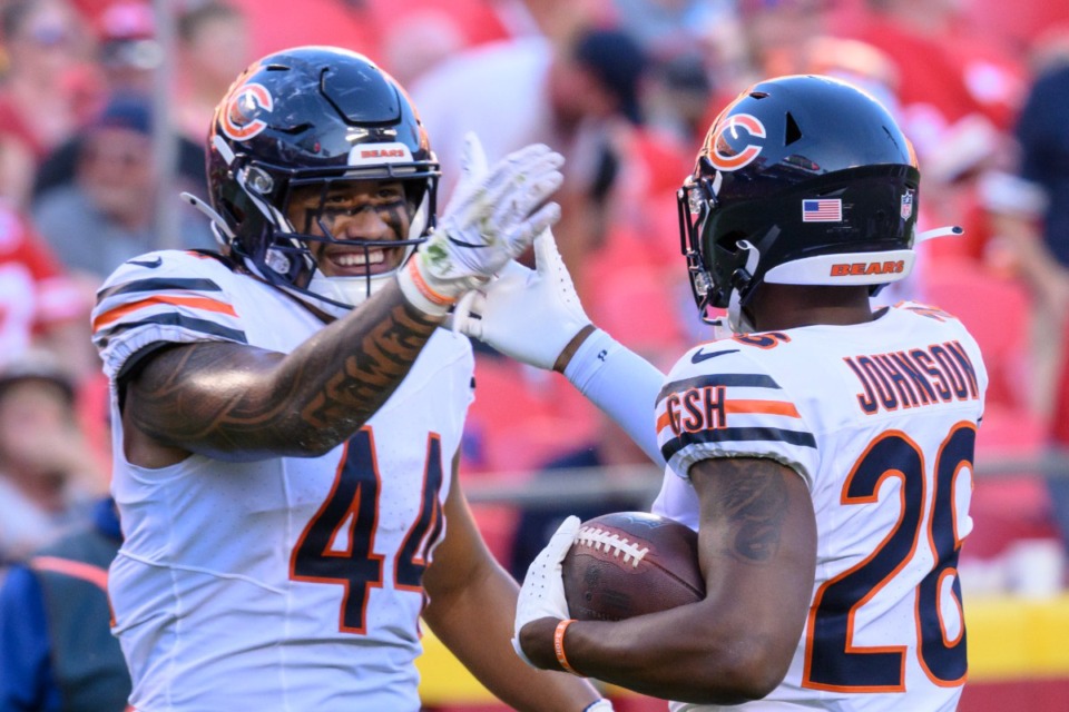 <strong>Chicago Bears safety Quindell Johnson (26) is congratulated by Chicago Bears linebacker Noah Sewell (44) after his interception against the Kansas City Chiefs during the second half of an NFL football game, Sunday, Sept. 24, 2023 in Kansas City, Mo.</strong> (Reed Hoffmann/AP File)