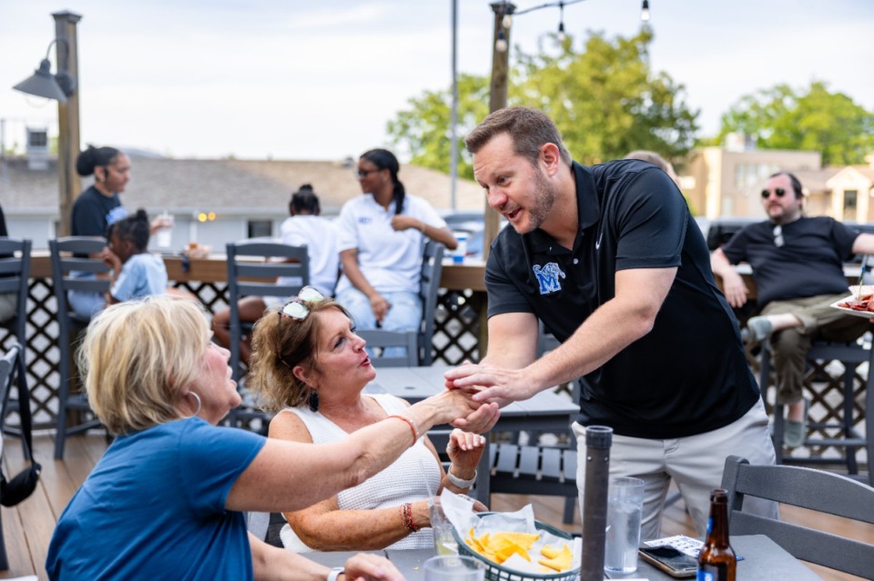 <strong>Memphis head football coach Ryan Silverfield shakes hands with fans before the second Tigers on Tour at Brookhaven Pub &amp; Grill Thursday, May 30, 2024.</strong> (Benjamin Naylor/The Daily Memphian)