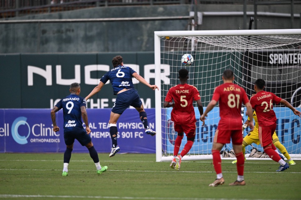 <strong>Zachary Duncan (6) puts one in the net against Phoenix Rising, with support from Luiz Fernando (9), at AutoZone Park on Friday, June 28, 2024.</strong> (Courtesy Memphis 901 FC)