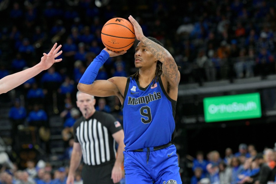 <strong>Memphis guard Caleb Mills (9) plays during the first half of an NCAA college basketball game against Virginia Tuesday, Dec. 19, 2023, in Memphis.</strong> (Brandon Dill/AP File)