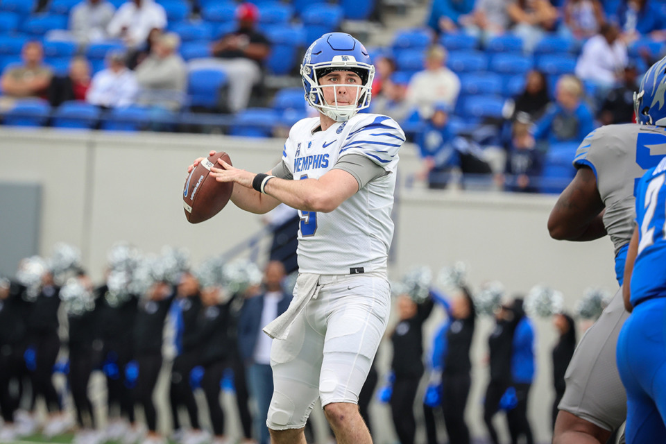 <strong>Memphis Tigers quarterback Seth Henigan, 9, throws the ball during the spring game at Simmons Bank Liberty Stadium April 20.</strong> (Wes Hale/Special to The Daily Memphian)