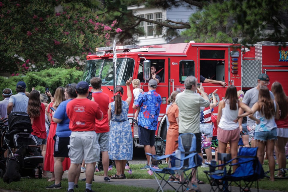 <strong>On July 4, 2023, parade goers greeted the Memphis Fire Department truck leading the High Point Terrace Independence Day parade.</strong> (Patrick Lantrip/The Daily Memphian file)