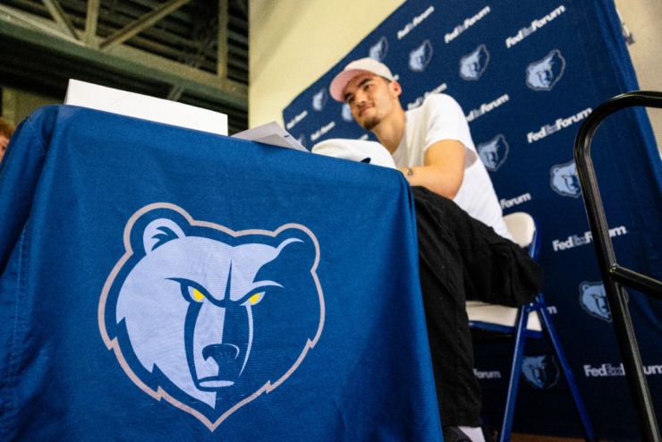 <strong>The Grizzlies new big man, Zach Edey, smiles as he signs autographs at the Redbirds game Wednesday, July 3, 2024, at AutoZone Park.</strong> (Benjamin Naylor/The Daily Memphian)