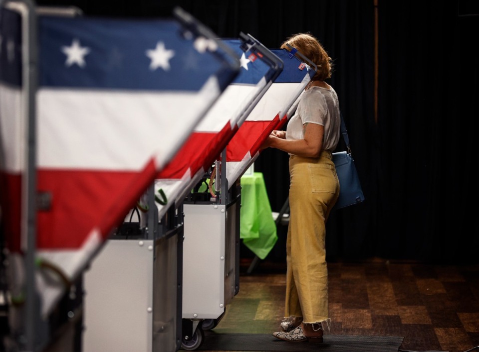 <strong>Voters (in a file photo) cast ballots during early voting at Raleigh United Methodist Church. Five of the nine seats on Memphis-Shelby County Schools board are on the ballot Aug. 1.</strong> (Mark Weber/The Daily Memphian)