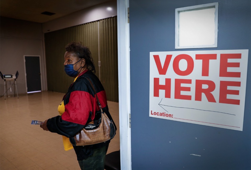 <strong>Five of the nine seats on Memphis-Shelby County Schools board are on the ballot Aug. 1.&nbsp;A voter (in a file photo) prepares to cast a ballot at Abundant Grace Fellowship Church.</strong> (Mark Weber/The Daily Memphian)