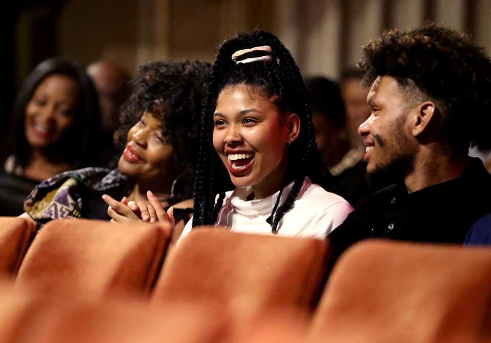 <strong>Victorie Franklin (center) and Jordan Franklin (right), the grandchildren of Aretha Franklin, laugh as Rev. Jesse Jackson makes a joke on stage at the 2018 Freedom Awards.&nbsp;</strong>(Houston Cofield/Daily Memphian)