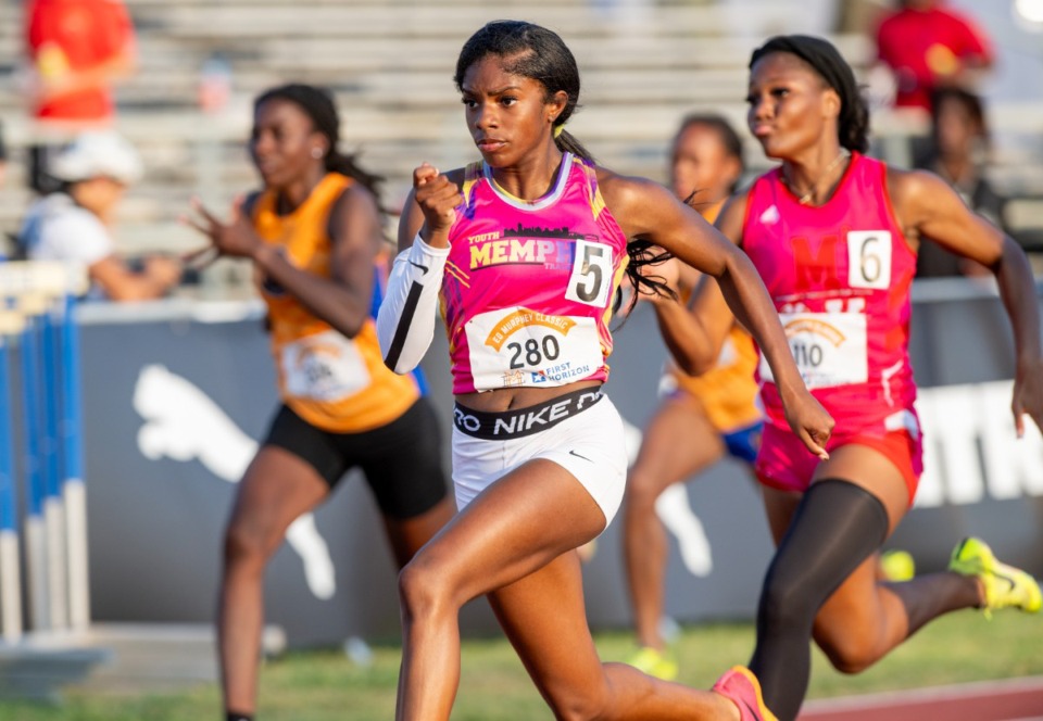 <strong>Jasmine McClelland of the Youth Track and Field of Memphis finishes ahead of the field in the Girl's 100m race at the Ed Murphey Classic Friday at the University of Memphis track field.</strong>&nbsp;<strong>This picture is a clue for No. 7 across.</strong> (Greg Campbell/Special to The Daily Memphian)