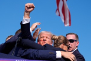 <strong>Republican presidential candidate former President Donald Trump is surrounded by U.S. Secret Service agents at a campaign rally, Saturday, July 13, 2024, in Butler, Pa.</strong> (Evan Vucci/AP)