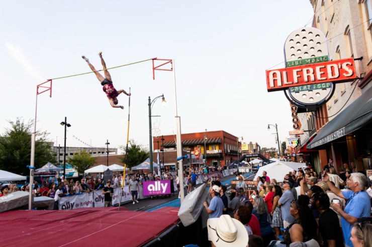 <strong>Chris Nilsen attempts to clear the bar during the John &ldquo;Buck&rdquo; Ewing PRO Men&rsquo;s Pole Vault on the final day of the Ed Murphey Classic on Beale Street.</strong> (Brad Vest/Special to The Daily Memphian)