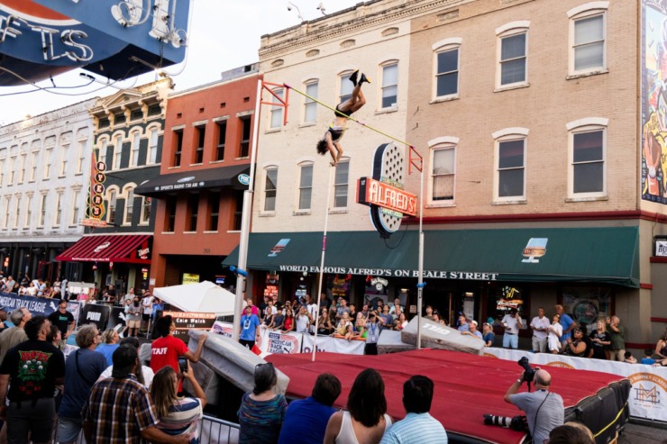 <strong>Cole Walsh attempts to clear the bar during the John &ldquo;Buck&rdquo; Ewing PRO Men&rsquo;s Pole Vault on the final day of the Ed Murphey Classic on Beale Street.</strong> (Brad Vest/Special to The Daily Memphian)