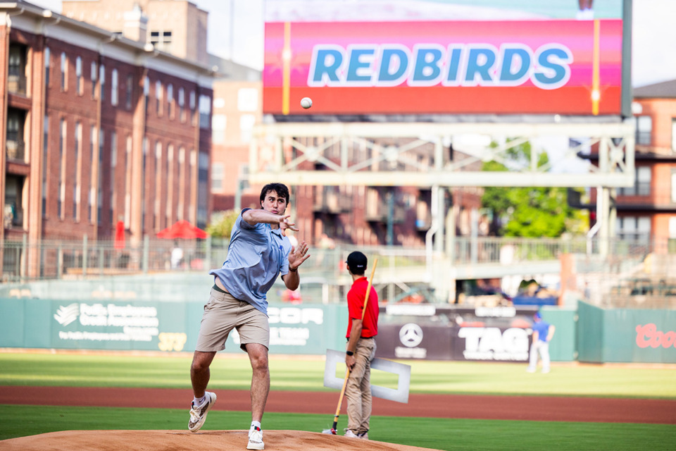 <strong>University of Memphis quarterback Seth Henigan throws out the first pitch during the Redbirds' annual U of M night July 20.</strong> (Benjamin Naylor/The Daily Memphian)