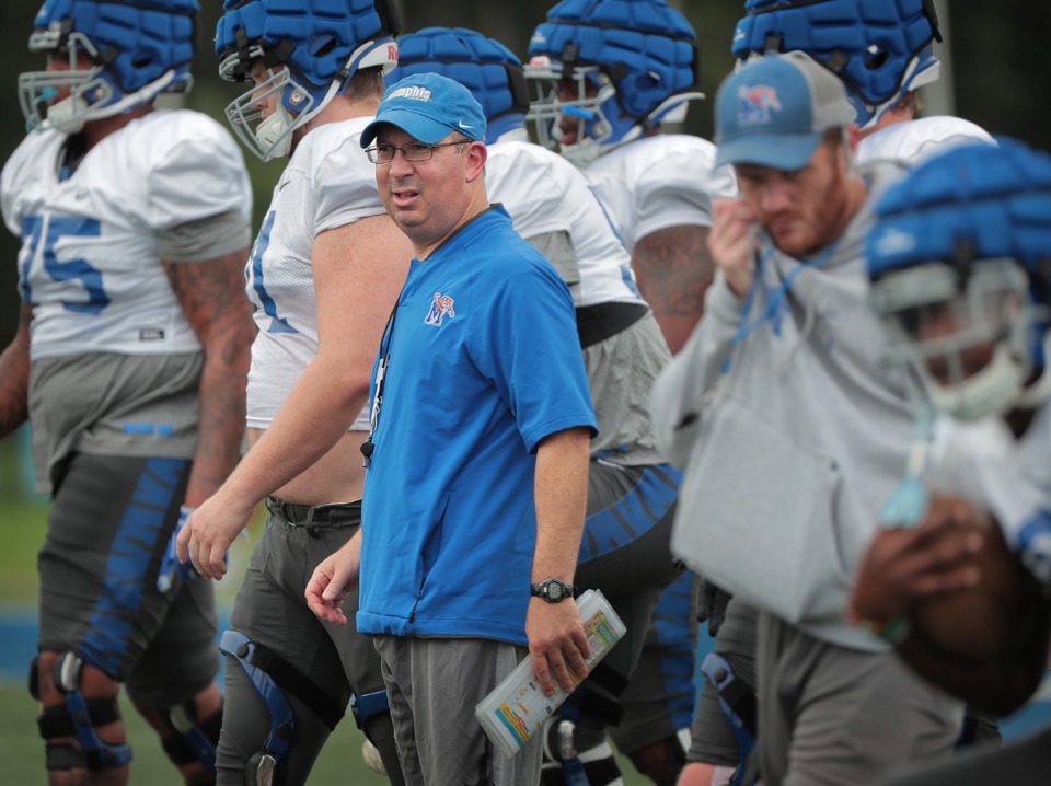 <strong>Memphis Tigers' special teams coordinator Pete Lembo lines up players for warm-up during practice at the Billy J. Murphy Athletic Complex on Thursday, Aug. 8.</strong>&nbsp;<strong>&ldquo;He&rsquo;s got tremendous experience,&rdquo; said head coach Mike Norvell. &ldquo;He&rsquo;s a great resource for our staff and also the players.&rdquo;</strong> (Jim Weber/Daily Memphian)