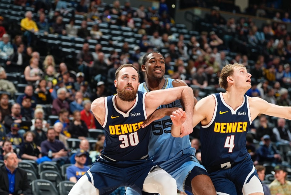 <strong>Denver Nuggets center Jay Huff, left, signed a two-way contract with the Memphis Grizzlies. Trey Jemison, middle, was released.</strong>&nbsp;(David Zalubowski/AP file)