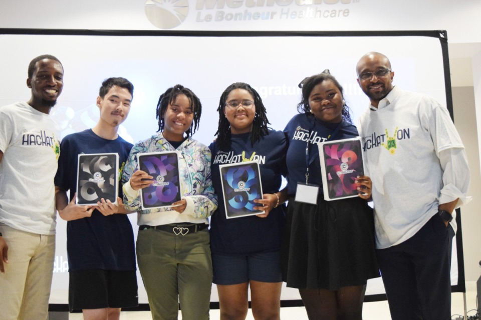 <strong>Jean-Francois Mahoro, CodeCrew&rsquo;s Director of&nbsp; K-12; CodeCrew students, Alan Ji, Naomi Leverette, Kennedy Jefferson, Kennedi Stewart; Meka Egwuekwe, CodeCrew co-founder and executive director.</strong> (Submitted)