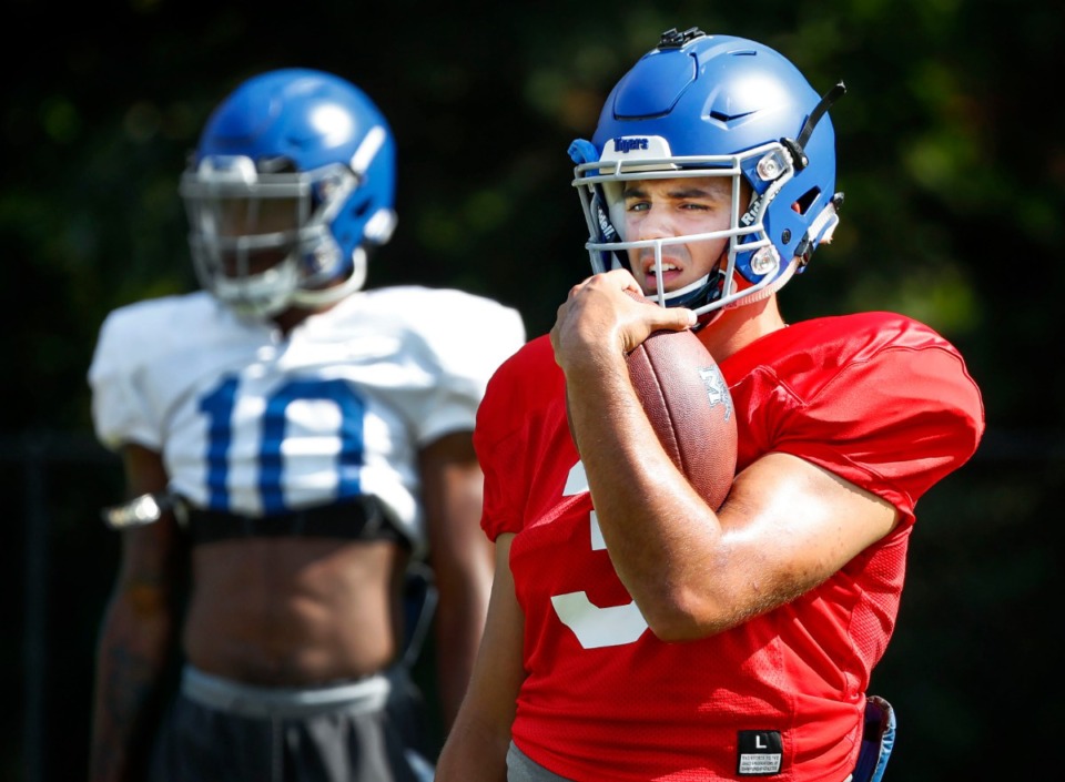 <strong>University of Memphis quarterback Brady White (right) goes through drills during practice on Monday, Aug. 5.</strong> <span class="s1"><strong>&ldquo;What we just saw on that practice field is night and day from what we had in-depth (last year),&rdquo; head coach Mike Norvell said.</strong> </span>(Mark Weber/Daily Memphian)