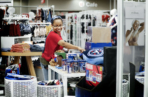 <strong>Visual merchandiser Debra Powers sorts through college apparel at the Target on Colonial Road Aug. 20, 2019.</strong> (Mark Weber/The Daily Memphian file)