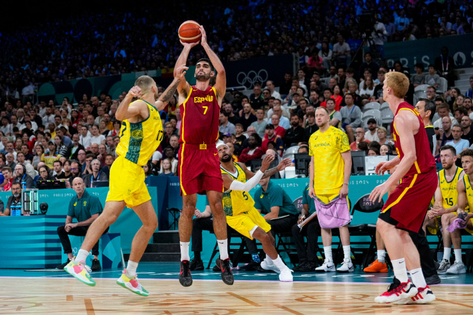 <strong>Santi Aldama, of Spain, shoots over Jack McVeigh, of Australia, in a men's basketball game at the 2024 Summer Olympics, Saturday, July 27, 2024 in Villeneuve-d'Ascq, France.</strong> (AP Photo/Mark J. Terrill)