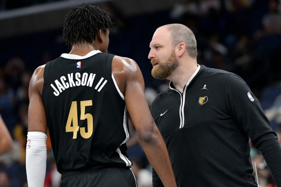 <strong>Memphis Grizzlies head coach Taylor Jenkins, right, talks with forward GG Jackson (45) in the first half of an NBA basketball game against the Denver Nuggets, Sunday, April 14, 2024, in Memphis, Tenn.</strong> (AP Photo/Brandon Dill)