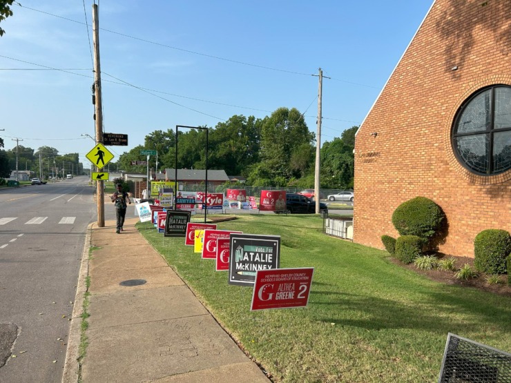 <strong>Signs for Althea Greene, Natalie McKinney and other candidates line Springdale Street outside the polling site at Springdale Baptist Church.</strong> (King Jemison/The Daily Memphian).