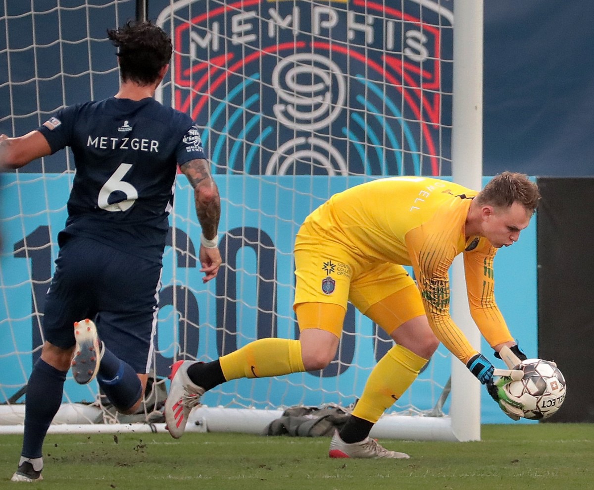 <strong>Memphis goalie Jeff Caldwell scoops up a shot attempt during 901FC's 2-1 loss to North Carolina FC at AutoZone Park on Aug. 10, 2019.</strong> (Jim Weber/Daily Memphian)