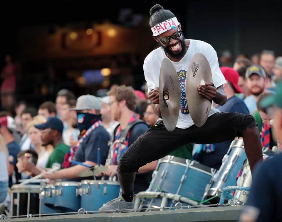 <strong>Soccer fans greet their team at the start of during 901FC's game against North Carolina FC at AutoZone Park on Aug. 10, 2019.</strong> (Jim Weber/Daily Memphian)