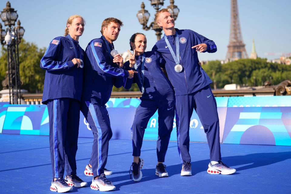 <strong>Taylor Knibb, left, Morgan Pearson, Taylor Spivey and Seth Rider, right, of the United States, pose during a medal ceremony for the mixed relay triathlon at the 2024 Summer Olympics, Monday, Aug. 5, 2024, in Paris, France.</strong> (Vadim Ghirda/AP Photo)