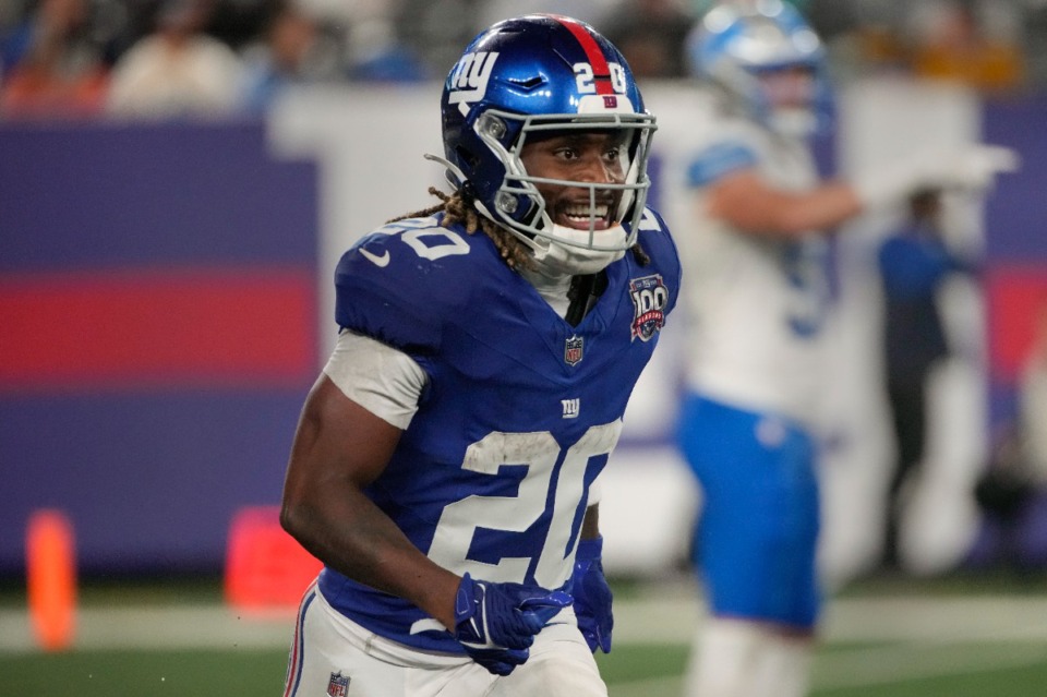 <strong>New York Giants running back Eric Gray (20) reacts after scoring a touchdown against the Detroit Lions during the second quarter of an NFL football game, Thursday, Aug. 8, 2024, in East Rutherford, N.J.</strong> (Pamela Smith/AP)