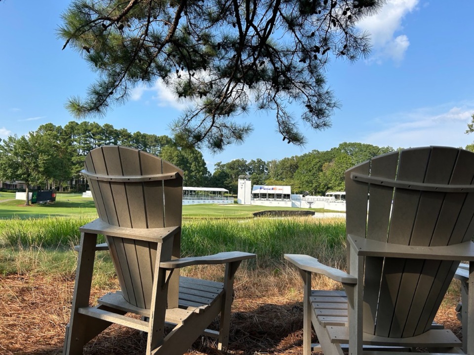 <strong>Adirondack chairs in the shade near Birdies and Bubbles provide an excellent place to watch the No. 14 green at the FedEx St. Jude Championship at TPC Southwind.</strong> (King Jemison/The Daily Memphian)