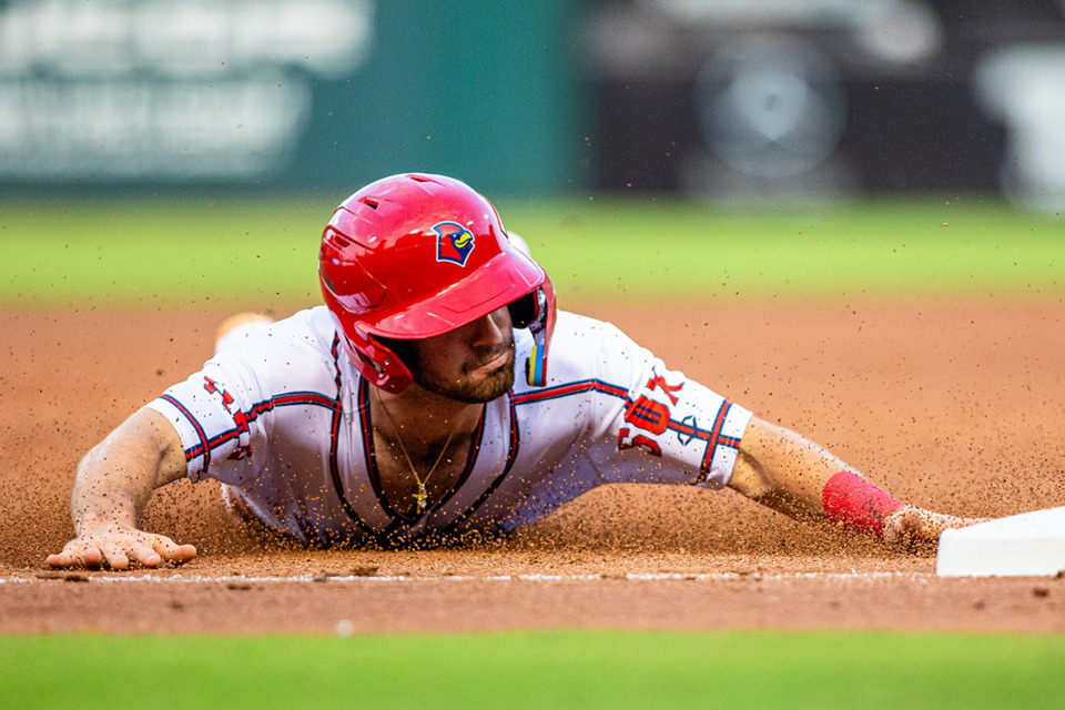 <strong>Thomas Saggese slides into third base during the Memphis Redbirds game Aug. 10.</strong> (Benjamin Naylor/The Daily Memphian)