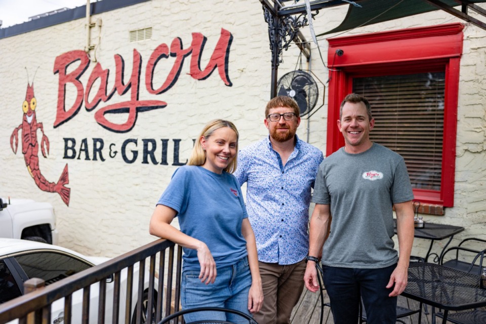 <strong>(From left) Amara Jameson, Tyler Hamilton and Crosby Keltner are the new owners of Bayou Bar &amp; Grill.</strong> (Benjamin Naylor/The Daily Memphian)