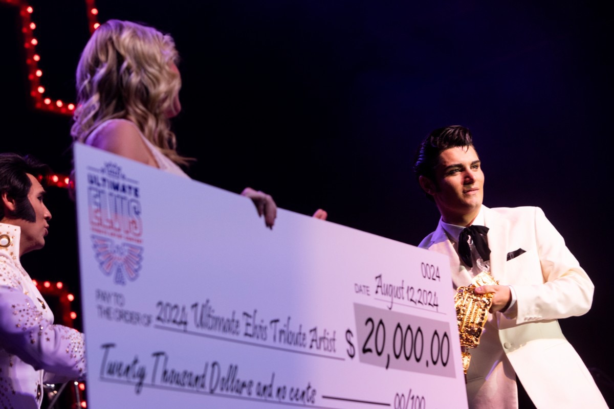 <strong>Emilio Santoro reacts after winning the 2024 Ultimate Elvis Tribute Contest at the Graceland Soundstage on Monday. The 2024 contest champion won a grand prize of $20,000.</strong> (Brad Vest/The Daily Memphian)