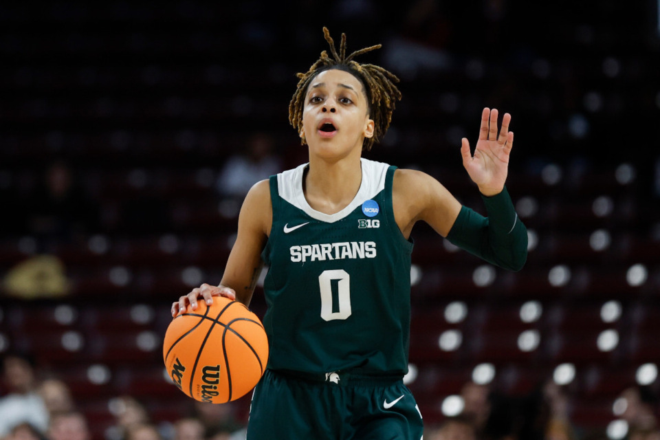 <strong>Michigan State guard DeeDee Hagemann brings the ball up court during the first half of a first-round college basketball game against North Carolina in the women's NCAA Tournament in Columbia, S.C., Friday, March 22, 2024.</strong> (AP File Photo/Nell Redmond)