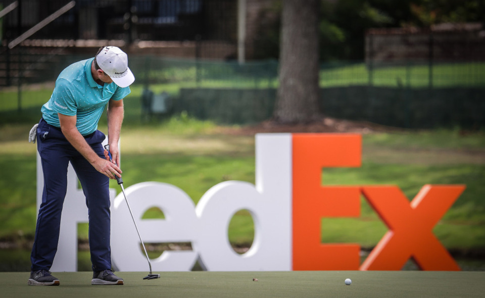 <strong>Justin Rose putts for birdie on the 18th green with the course record on the line during the third day of the FedEx St. Jude Championship at TPC Southwind Aug. 12, 2023.</strong> (Patrick Lantrip/The Daily Memphian file)