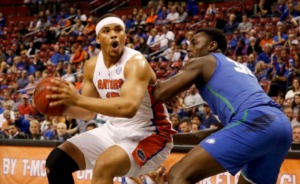 <strong>Florida forward Isaiah Stokes (left) looks to the basket as Florida Gulf Coast forward Brian Thomas (30) defends in the first half of an NCAA college basketball game, part of the Orange Bowl Classic tournament on Dec. 22, 2018, in Sunrise, Fla.</strong> (AP Photo/Joe Skipper)