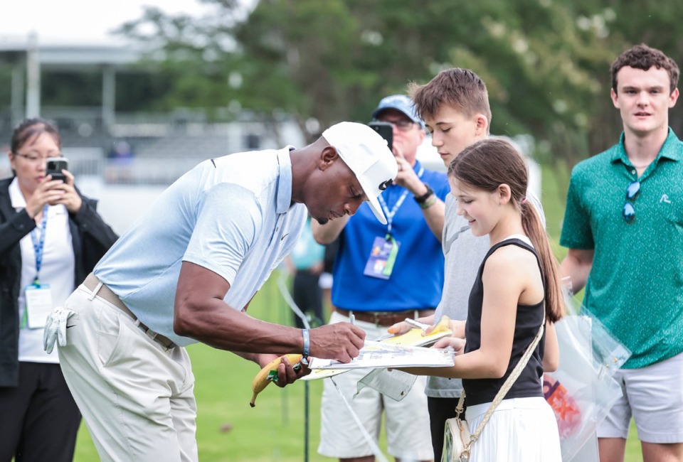 <strong>University of Memphis head coach signs autographs during the pro-am round of golf at the FedEx St. Jude Championship Aug. 14, 2024.</strong> (Patrick Lantrip/The Daily Memphian)