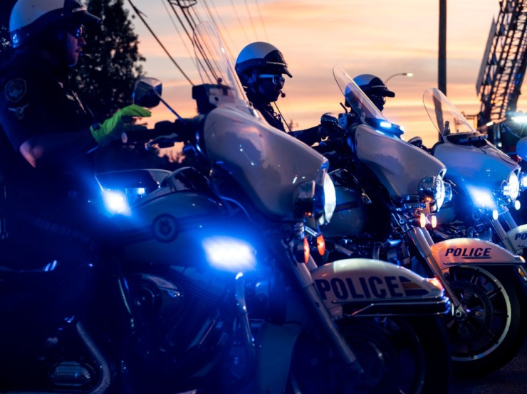 <strong>Memphis police officers line up motorcycles with blue lights flashing in honor of Demetrice Johnson, who died following a car crash on Aug. 2.&nbsp;</strong>(Brad Vest/Special to The Daily Memphian)