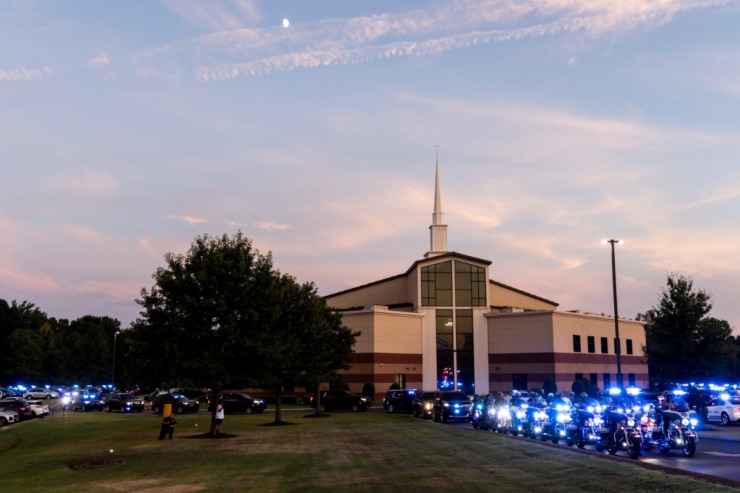 <strong>Officers line up at the start of Wednesday&rsquo;s Sea of Blue event at Oak Grove Missionary Baptist Church.</strong>&nbsp;(Brad Vest/Special to The Daily Memphian)