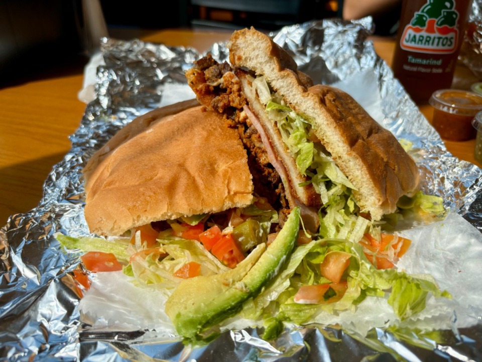 <strong>La Palapa&rsquo;s Torta Cubana has a thin-breaded chicken cutlet, steak, chorizo and ham, a healthy dose of mayo, avocado, lettuce, tomato and jalape&ntilde;o.</strong> (Joshua Carlucci/Special to The Daily Memphian)