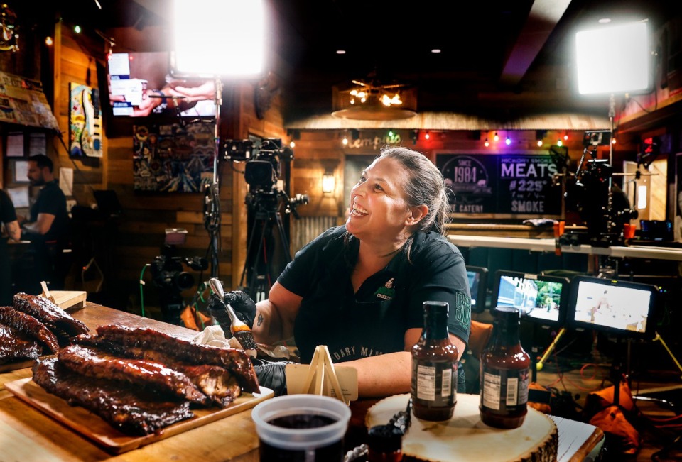 <strong>Corky's BBQ&rsquo;s Yolanda Bowlers prepares ribs for a live segment on QVC Aug. 14.</strong> (Mark Weber/The Daily Memphian)